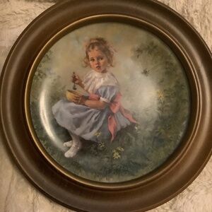 Little miss muffet collectible plate in wooden frame